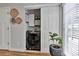 Laundry area with modern appliances, built-in shelving, and natural light at 10042 Hudson St, Thornton, CO 80229