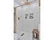 This renovated shower features white subway tiles, a rainfall shower head, and an alcove with mosaic tile details at 10042 Hudson St, Thornton, CO 80229