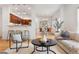Bright, open-concept living space connects the kitchen and dining areas seamlessly at 4190 W Alameda Ave, Denver, CO 80219