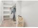 Walk-in closet with custom shelving for optimal storage at 4190 W Alameda Ave, Denver, CO 80219