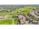 An elevated view showing the home's proximity to open space, walking trails, and neighboring houses at 10057 Cedaridge Way, Highlands Ranch, CO 80129