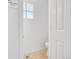 Main floor bathroom featuring bright white walls, and a clear glass block window at 10057 Cedaridge Way, Highlands Ranch, CO 80129
