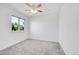 Bedroom with a ceiling fan and a window providing ample natural light at 10057 Cedaridge Way, Highlands Ranch, CO 80129