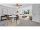 Cozy living room with modern decor, a large window, and comfortable seating arrangements at 10057 Cedaridge Way, Highlands Ranch, CO 80129