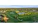 Aerial view featuring golf course and residential area at 8767 Chase Dr # 195, Arvada, CO 80003
