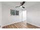 Bedroom filled with natural light from the window and a ceiling fan at 8767 Chase Dr # 195, Arvada, CO 80003