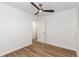 Bright bedroom features wood-look floors and modern ceiling fan at 8767 Chase Dr # 195, Arvada, CO 80003