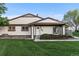 Charming home with a well-maintained lawn, complemented by neat landscaping and a welcoming entrance at 8767 Chase Dr # 195, Arvada, CO 80003