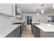 Updated kitchen with stainless steel appliances, spacious counters, and a sliding door to the yard at 8767 Chase Dr # 195, Arvada, CO 80003