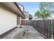 Exterior patio area surrounded by wooden fence at 8767 Chase Dr # 195, Arvada, CO 80003