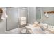 Well-maintained bathroom with a shower over tub combination and a single sink vanity at 10572 E Orchard Pl, Englewood, CO 80111