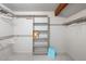 This is a large walk-in closet with a custom organizing system for ample storage at 10572 E Orchard Pl, Englewood, CO 80111