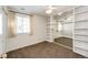 Spacious bedroom with built-in shelving and mirrored wall at 14393 E Marina Dr, Aurora, CO 80014