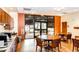 Community room with tables, chairs, and coffee bar at 14393 E Marina Dr, Aurora, CO 80014