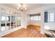 Bright dining room with hardwood floors and large windows at 14393 E Marina Dr, Aurora, CO 80014