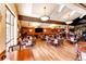 Large dining room with multiple tables and chairs at 14393 E Marina Dr, Aurora, CO 80014