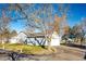 Side view of the house with attached garage at 14393 E Marina Dr, Aurora, CO 80014