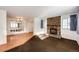 Living room with a stone fireplace and hardwood floors at 14393 E Marina Dr, Aurora, CO 80014