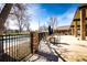 Community pool area with patio tables and umbrellas at 14393 E Marina Dr, Aurora, CO 80014