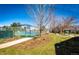 Well-maintained tennis court with surrounding landscape at 14393 E Marina Dr, Aurora, CO 80014