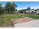 Spacious backyard featuring a brick patio and lush green grass at 2735 S Dahlia St, Denver, CO 80222