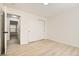 Spacious bedroom with double doors and an additional room at 8140 Washington St # 135, Denver, CO 80229