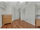 Bedroom with wood floors, shelving, and closet space at 19140 E Milan Cir, Aurora, CO 80013