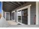 Balcony showcasing sliding doors providing plenty of natural light to the interior space at 3482 S Eagle St # 102, Aurora, CO 80014