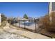 Community pool surrounded by well-maintained grounds and residential buildings at 3482 S Eagle St # 102, Aurora, CO 80014