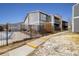 Exterior view of the complex with a pool and walking paths at 3482 S Eagle St # 102, Aurora, CO 80014