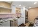 Updated kitchen with stainless steel appliances and granite countertops at 3482 S Eagle St # 102, Aurora, CO 80014