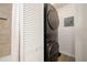 Efficient laundry area with stackable washer and dryer, plus a convenient closet for storage at 3482 S Eagle St # 102, Aurora, CO 80014