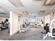 Well-equipped fitness center with various exercise machines and ample natural light at 595 S Alton Way # 1C, Denver, CO 80247