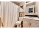 Full bathroom with vanity, framed mirror, and a shower curtain at 330 N Wagonwheel Trl, Castle Rock, CO 80104