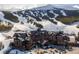 Aerial shot of beautiful ski resort nestled at the base of ski slops, providing easy access to skiing at 1521 Ski Hill Rd # 8318, Breckenridge, CO 80424