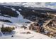 Panoramic aerial view showcasing ski resort in snowy conditions surrounded by mountains and trees at 1521 Ski Hill Rd # 8318, Breckenridge, CO 80424