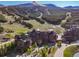 Stunning aerial shot of a resort surrounded by ski trails and lush greenery, offering breathtaking mountain views at 1521 Ski Hill Rd # 8318, Breckenridge, CO 80424