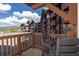 Outdoor balcony featuring scenic views and an outdoor seating area with table at 1521 Ski Hill Rd # 8318, Breckenridge, CO 80424