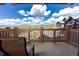 Balcony with outdoor seating and a scenic view of the surrounding mountains and landscape at 1521 Ski Hill Rd # 8318, Breckenridge, CO 80424