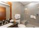 Well-lit bathroom showcasing a granite countertop, a glass-door shower, and modern fixtures at 1521 Ski Hill Rd # 8318, Breckenridge, CO 80424