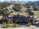 Luxurious resort exterior with stunning mountain views and well-maintained landscaping at 1521 Ski Hill Rd # 8318, Breckenridge, CO 80424