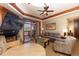 Cozy living room with a fireplace, television, comfortable seating, and access to a balcony at 1521 Ski Hill Rd # 8318, Breckenridge, CO 80424
