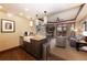 Open-concept living space with a kitchen, dining area, fireplace, and comfortable seating at 1521 Ski Hill Rd # 8318, Breckenridge, CO 80424