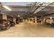 Spacious parking garage with ample parking space and concrete columns for structural support at 1521 Ski Hill Rd # 8318, Breckenridge, CO 80424