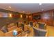 Cozy theater room featuring comfortable seating, warm lighting, and a large screen for immersive entertainment at 1521 Ski Hill Rd # 8318, Breckenridge, CO 80424