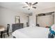 Cozy bedroom with a full closet, dresser and light gray carpeting at 3065 W 80Th Ave, Westminster, CO 80030