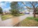 A cozy single-Gathering home featuring a long driveway, with mature trees at 3065 W 80Th Ave, Westminster, CO 80030