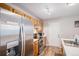 Well-lit kitchen featuring stainless steel appliances, and ample counter space at 3065 W 80Th Ave, Westminster, CO 80030