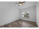 Bedroom with large window and hardwood flooring at 8422 S Upham Way # G60, Littleton, CO 80128