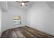 Bedroom with vaulted ceilings and gorgeous laminate flooring at 8422 S Upham Way # G60, Littleton, CO 80128